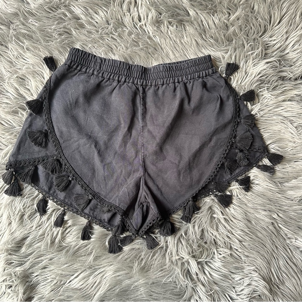 Black shorts with tassels
